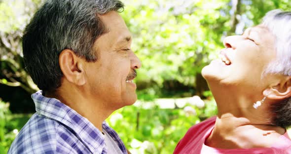 Senior couple having fun in park