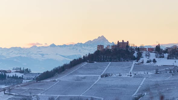 Pan: Italy Piedmont panoramic winter snow view wine yards unique landscape at sunset