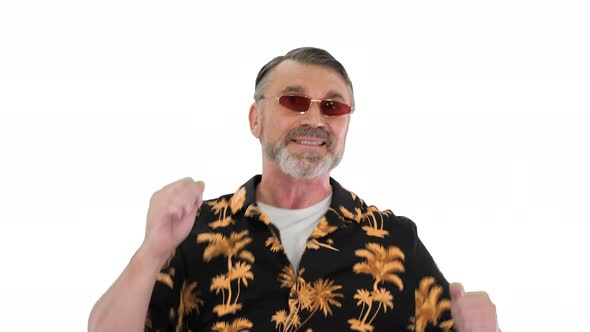 Cool Grandfather in Sunglasses Dancing in a Funny Way on White Background