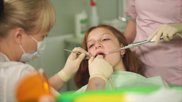 A Dentist Who Did a Tooth Brushing in a Teenager in a Dental Clinic