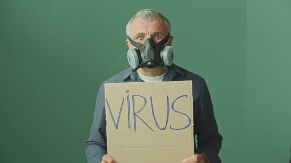 Anxious Man Wearing a Mask to Protect Himself From a Viral Infection