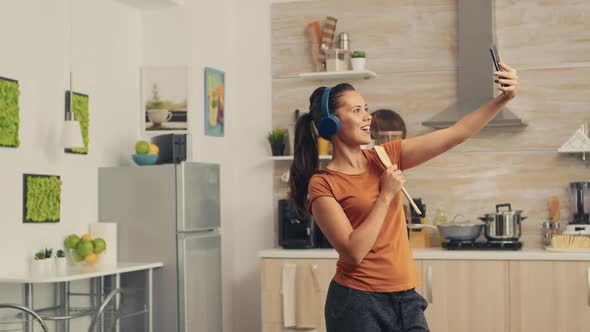 Happy Woman Taking a Selfie