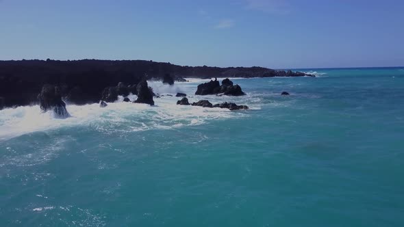 Flying Over The Rugged Coastline Of Hawaii