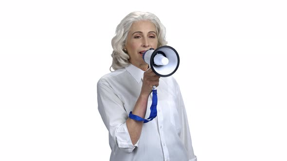 Mature Woman with Megaphone on White Background