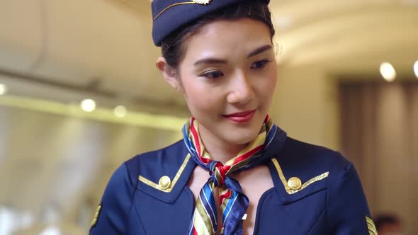 Cabin Crew or Air Hostess Working in Airplane