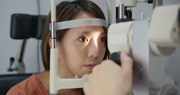 Woman check eye in the clinic