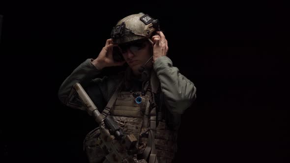 Special Forces US Soldier Takes Off His Helmet in the Dark