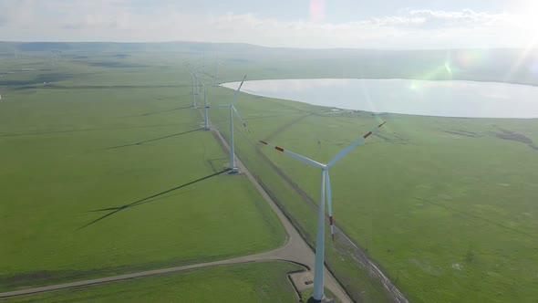 Aerial View to the Wind Turbine Power Station with Windmills Generators