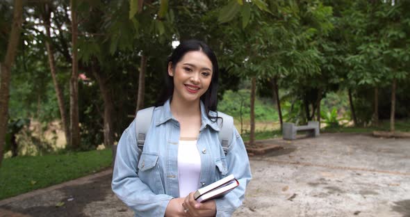 Asian Woman Student Walking To School