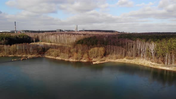 Mining excavation flooded with water.