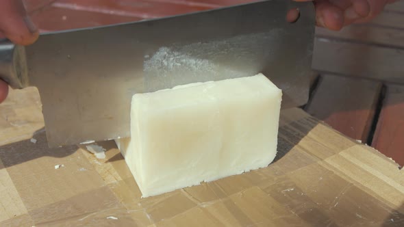 Cutting natural homemade bar soap into bars