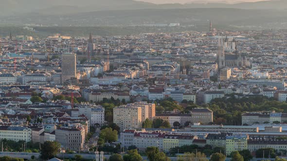 Aerial Panoramic View of Vienna City with Skyscrapers Historic Buildings and a Riverside Promenade