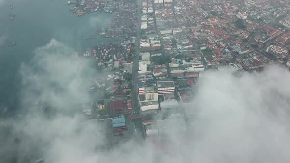 Aerial drone view amazing landscape of thick fog cover George Town