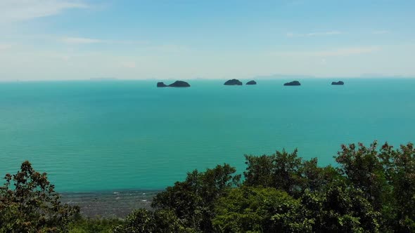 Five Sisters Islands in Serene Water Surface, Enchanting Landscape, Greenery and Deep Calm Water