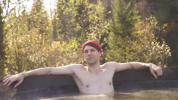 Young Man Enjoy Spending Time in Bath Outdoors