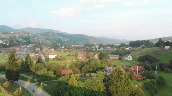 Scenic View of Mountain Village in Valley