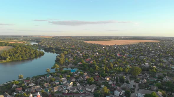 River Suburb And Field