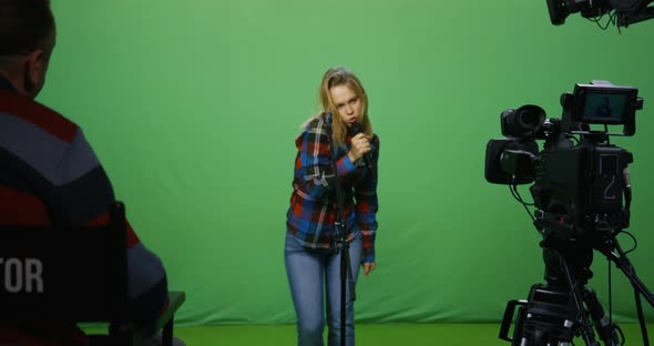 Woman Singing at an Audition