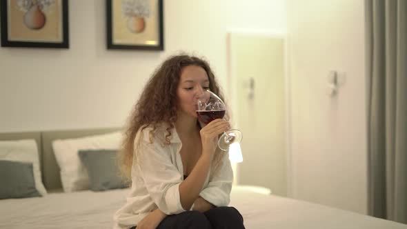 Smiling Mixed Race Lady Relieves Stress Drinking Alcohol