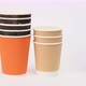 stack of disposable paper cups for coffee and tea on a white background - VideoHive Item for Sale