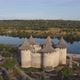 Aerial Dolly Out Shot of Medieval Fort in Soroca Republic of Moldova - VideoHive Item for Sale