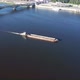 Empty Cargo Barge with Tug Moving Along the Fairway of the Big River on a Summer Day - Aerial Shot - VideoHive Item for Sale