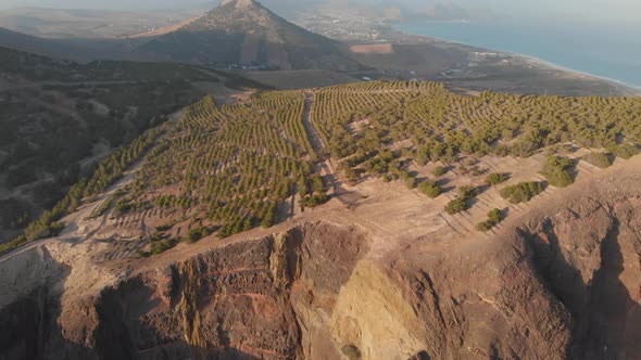 Aerial ascending shot epic landscape crop mountain fields, Porto Santo island