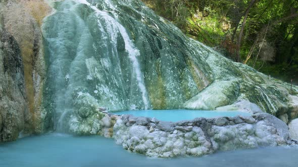 Geothermal pool and hot spring in Tuscany, Italy. Bagni San Filippo natural thermal waterfall in the