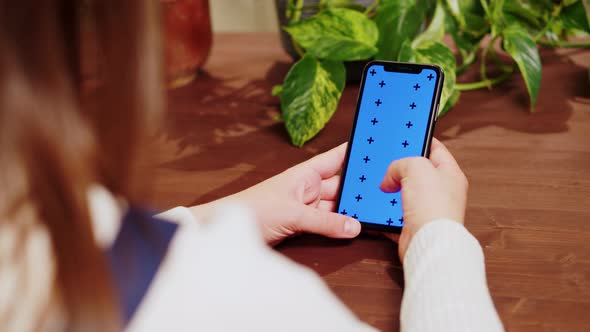 Florist Woman Using Smartphone with Chroma Key