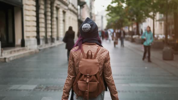 Pretty Girl Rear View Enjoying Spring Outdoors. City Lifestyle. Stylish Hipster Woman Tourist