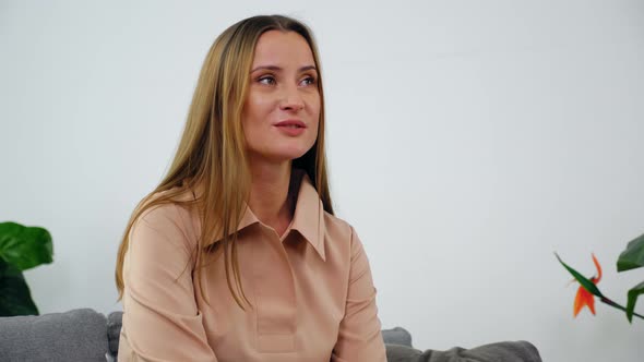 Woman Patient with Mental Health Problem Sitting on Couch Talking Psychologist