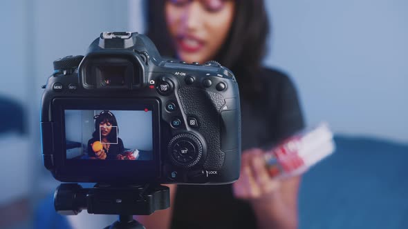 Young Woman Recording Video for Social Media in Her Bedroom