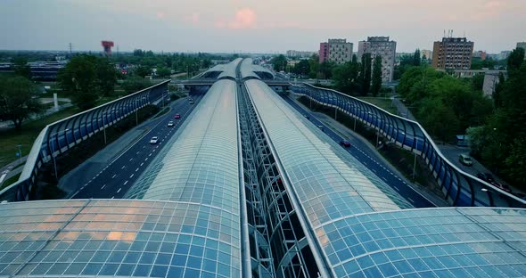 Aerial view on a glass tunnel on a motorway.