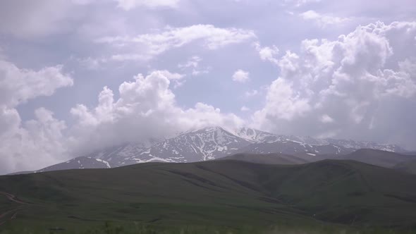 Clouds Moving Over The Mountain Timelaps