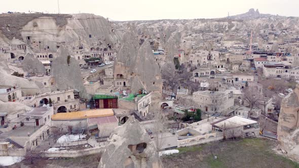 Goreme town with mosque and residences in rock formations, Cappadocia region, Turkey