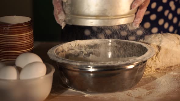 Close Up Shot of Baker Who Sifts the Flour Through a Sieve for the Chef's