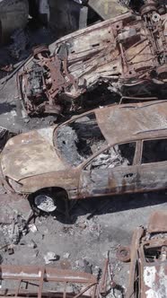 Vertical Video of a Dump of Destroyed Cars During the War in Ukraine