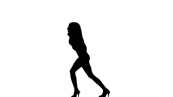 A Silhouette Woman Is Casually Dancing Against A White Background