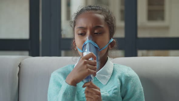 Sick Girl Intense Breathing Through Nebulizer Mask