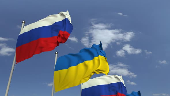 Flags of Ukraine and Russia at International Meeting