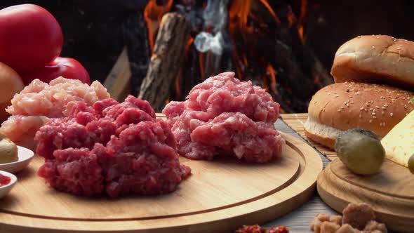 Raw Ingredients for Homemade Burger Preparation Minced Meat on the Wooden Board