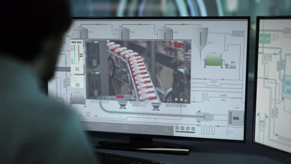 Automated Product Manufacturing Equipment Monitored By Factory Managing Program alt