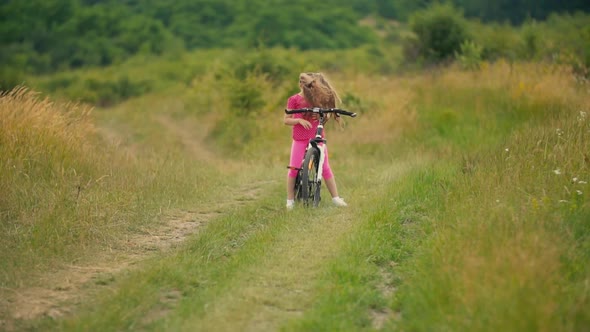 Girl Riding a Bike