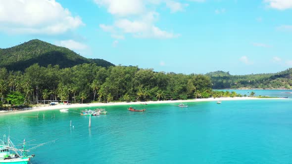 Aerial nature of relaxing lagoon beach wildlife by blue ocean and white sandy background of adventur