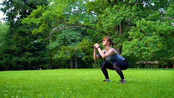 Girl Doing Squats in Nature