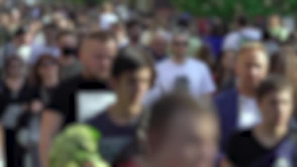 Silhouettes of People Walking in a Crowd Slow Motion