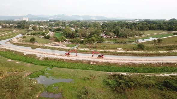 Aerial two excavator park 