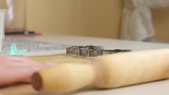 The Woman Rolls Out The Biscuit Dough. Cooking Marshmallow Sandwiches.