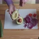 Woman Is Cutting Avocado for Snack - VideoHive Item for Sale