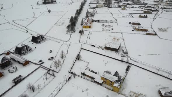 Aerial Drone Motion of Snowy Village.